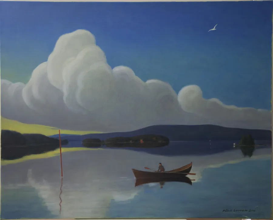 Rower and cumulus clouds