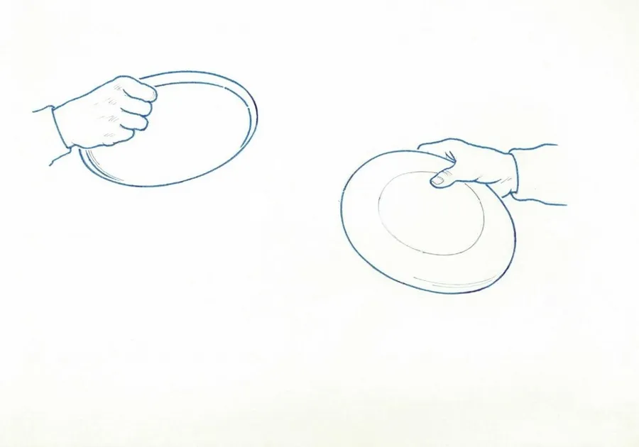 Backhand Throw: Grip on the Frisbee